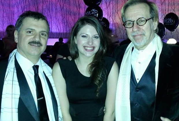 At the American Music Awards after party. From left, Paul Insinna (manager), Angelina and Robert Cutarella (producer).