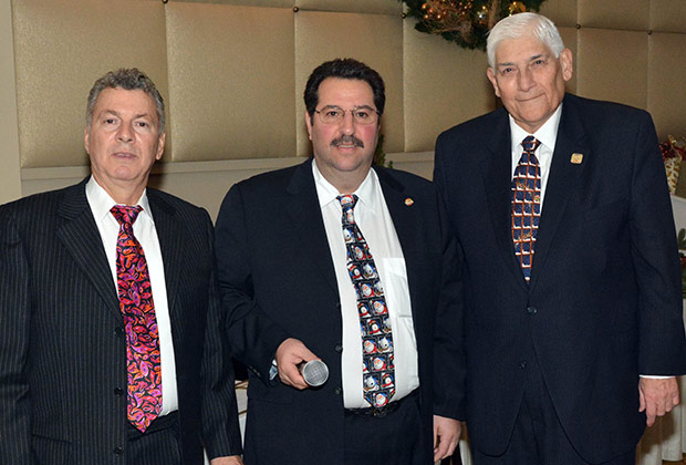 Paul Macropoulos, John Levas and Ted Malgarinos at last year's Christmas gala