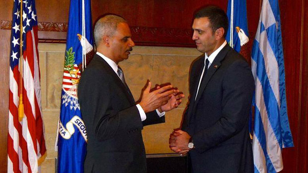 Greece’s Minister of Public Order and Citizen Protection Vassilis Kikilias (right) with US Attorney General Eric Holder