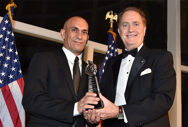 Khalil al-Dakhi receives the 2015 Oxi Day Award from Washington Oxi Day Foundation Founder and President Andy Manatos, PHOTO BY: BILL PETROS