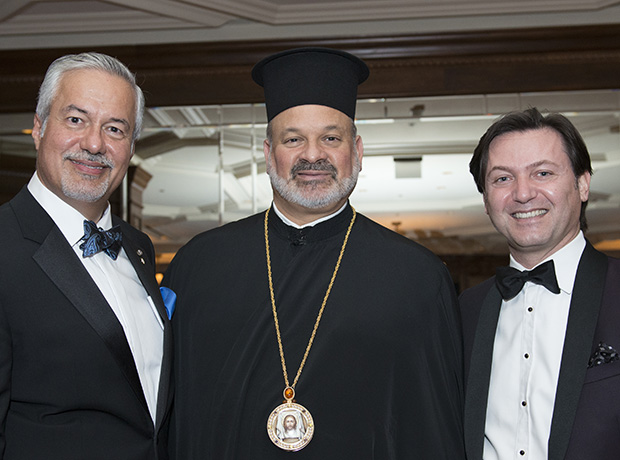 John Manos, His Grace Bishop Demetrios of Mokissos, and Yanni Valsamas