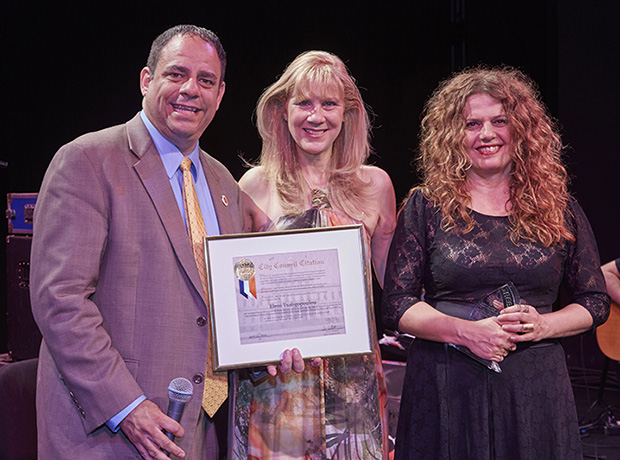Eleni Tsaligopoulou being honored with “AKTINA’s Distinguished Artist Award” and with a Citation on behalf of the City of New York. From left NYC Council Member Costa Constantinides, Elena Maroulleti, concert Executive Producer and President of AKTINA & CYPRECO, and Eleni Tsaligopoulou. PHOTO: ANASTASSIOS MENTIS