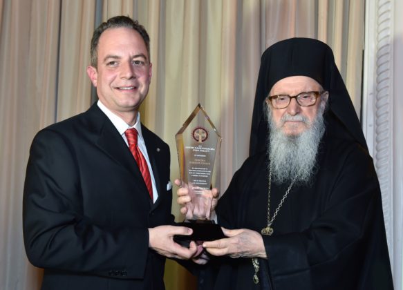 White House Chief of Staff Reince Priebus receives his Medal of St. Paul Award from Archbishop Demetrios