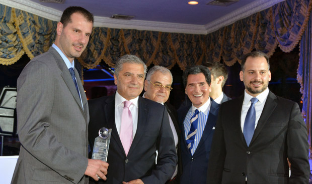 Honoree Michalis Kakiouzis with Mayor Yorgos Patoulis, Kostas Angeloudis, Ernie Anastos and Nikolas Katsimpras. Photo ETA Press
