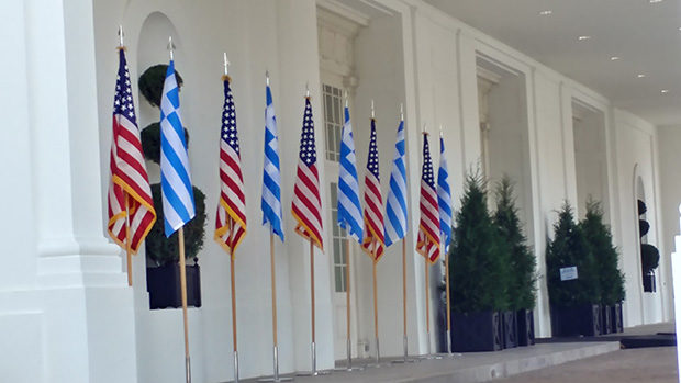 Greek and American flags welcomed the guests