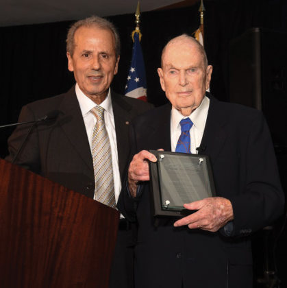 Hon. Consul General of Cyprus Andreas Kyprianides presents Aris Anagnos with the Life-time Achievement Award