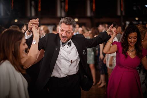 National Hellenic Museum Trustee Aristotle P. Halikias enjoys dancing with family and friends at NHM Gala 2017, Photo Credit: John Gress 2017