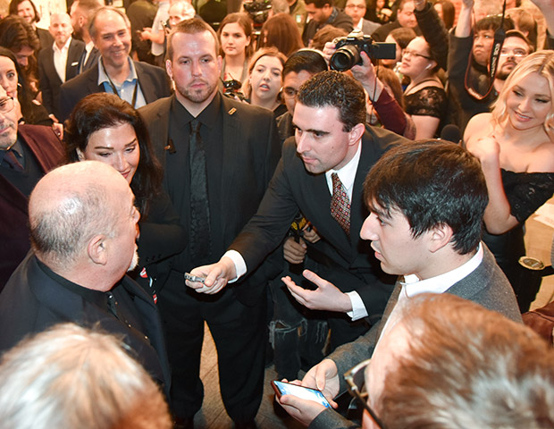 Billy Joel talks with reporters and with NEO's Markos Papadatos before the Long Island Hall of Fame ceremony. PHOTO: MIKE COLUCCI