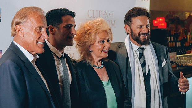 Executive Producer and Co-Writer Marianne Metropoulos with husband C. Dean Metropoulos and sons Evan & Daren at the film's premiere in London