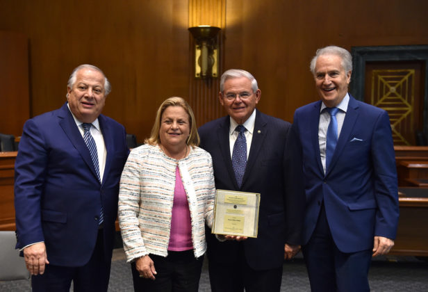 Ranking Member of the Senate Foreign Relations Committee Bob Menendez with (L-R) Philip Christopher, former Chairwoman of the House Foreign Affairs Committee Ileana Ros-Lehtinen, Andy Manatos