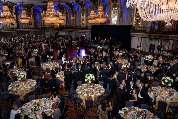 Over 600 guests enjoying dinner at the Hilton Chicago’s Grand Ballroom