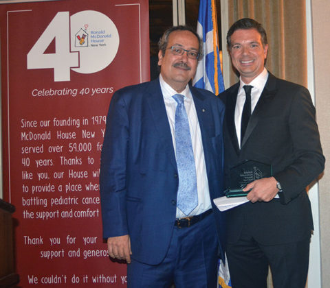 Dr. Spiros Spireas receiving the award from Spiros Maliagros, PHOTO: ETA PRESS