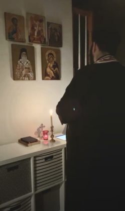 Father Nektarios Karantonis, Associate Priest at St. Nectarios Greek Orthodox Church in Charlotte, NC observes a Nightly Prayer Service for Protection from COVID-19 from his home. FACEBOOK SCREENSHOT