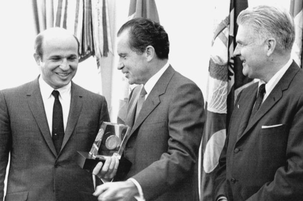 Mr. Rossides, left, was an assistant secretary of the Treasury in October 1969 when President Richard M. Nixon received a commemorative trophy marking the 100th anniversary of the Secret Service. Mr. Rossides oversaw the agency. At right was James J. Rowley, director of the Secret Service. UPI