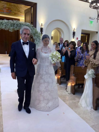 George Pantelidis with daughter Calliope walking down the aisle