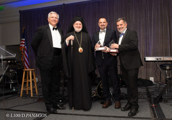 (Left to Right), Chairman Argyris Vassiliou and His Eminence Archbishop Elpidophoros of America present the Archbishop Iakovos Leadership 100 Award for Excellence to Dr. George D. Yancopoulos and Dr. Alexander Kitroeff