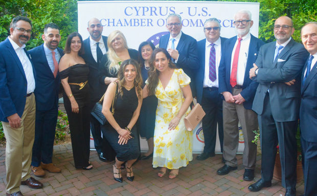 The Chamber Board: from left, Michael Hadjiloucas, Stathis Theodoropoulos, Demetrios Comodromos, Despina Axiotakis, Maria Pappas, President, Nicos Nicolaou, George Andreou, Theo David, Evis Savvides, Peter Kakoyiannis. Leaning in front, Jovanna Tannousis and Petroula Lambrou