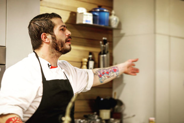 In action, Chef Christos Bisiotis teaching a class at the De Gustibus Cooking School at Macy's Herald Square in NYC (2018)