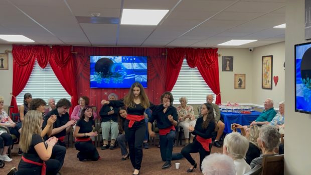 Gianna Fernandez, Rockledge, FL; Accounting, University of Florida. Gianna performing traditional Greek dances for residents at an assisted living facility