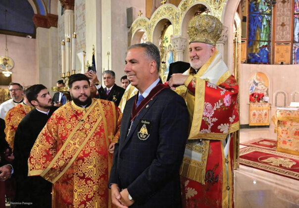 His Eminence Archbishop Elpidophoros conferring the Offikion of Archon Eftaxias upon Peter
