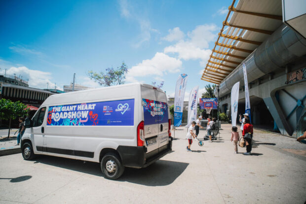 The Giant Heart Roadshow van brought the portable basket – and neighborhood children brought their game to the outreach event for THI’s Summer Youth Academy.