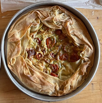 Baby tomatoes, eggs, mushroom, feta cheese in fyllo dough