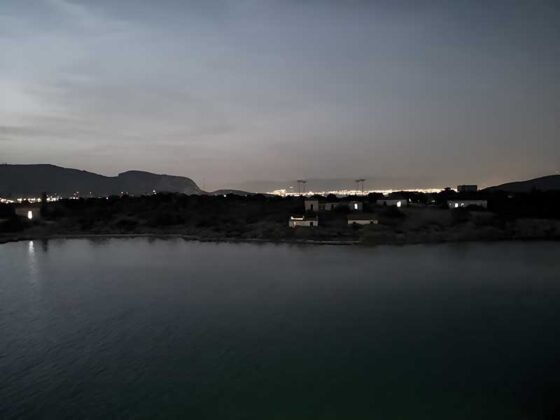 Ag. Giorgis Ph. Kostas Emmanouil: The abandoned houses of Agios Georgios island illuminated from within during Eri Dimitriadi’s xhibition. PHOTO: KOSTAS EMMANOUIL