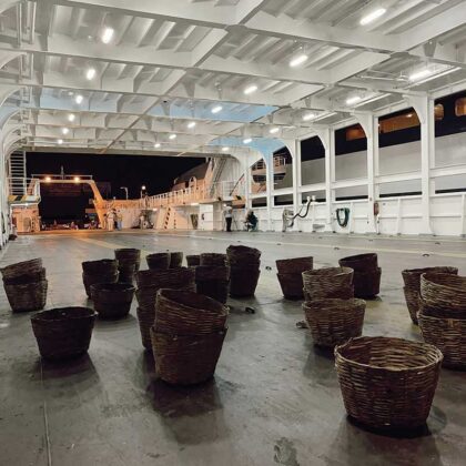 Clay baskets installed on the ferry deck as part of Eri Dimitriadi’s site-specific exhibition, referencing the story of a patient who tried to empty the sea with a basket to reach the opposite shore. Photo: Stamatis Koutsoukos