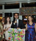 Consul of Greece proudly displaying the artwork gift from the Cathedral School Kindergarten Class. From left, Koula Sophianou, Head of School Sonia Celestin, 8th Grade graduate Veronica Blau, Consul Vangelis Kyriakopoulos, Event Chairs Roula Lambrakis and Lilly Gerontis-Pritchard, PHOTOS: ETA PRESS