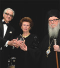 George S. Tsandikos, Leadership 100 Chairman, left, and Archbishop Demetrios present the Archbishop Iakovos Leadership 100 Award for Excellence to Angeliki (Lila) Lalaounis in honor of her late husband, Ilias I. Lalaounis.