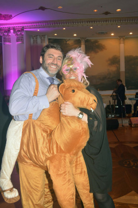 Hellenic Medical Society President Dr. George Liakeas in costume with a friend, PHOTO: ETA PRESS
