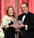 THI founder and Chairman Andrew Liveris offering the organization's highest award to Beatriz Perez, Senior Vice President and Chief Communications, Public Affairs, Sustainability and Marketing Assets Officer for The Coca-Cola Company