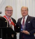 UHVA National Supreme Board member Peter Karahalios presenting the "PhilHellene of the Year" Award to PanHellenic Chairman Robert A. Buhler