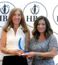 Hellenic Bar Association President Koula Alevizos Fournier (right) presents an award to Immediate Past President Vicki Pappas Karl for her service to the organization; PHOTO: HELLENIC BAR ASSOCIATION OF ILLINOIS